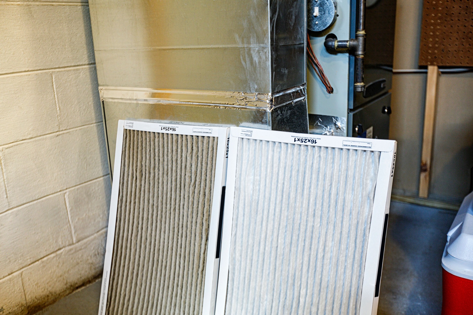 Dirty and Clean Residential Heating and Cooling Air Circulation Filters